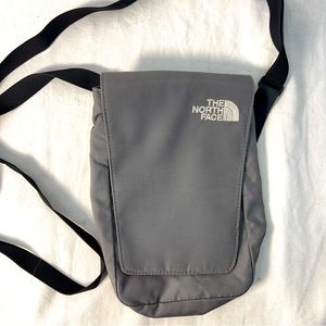 The North Face Crossbody Travel Hiking Trek Bag Grey small 8” with a zip pocket